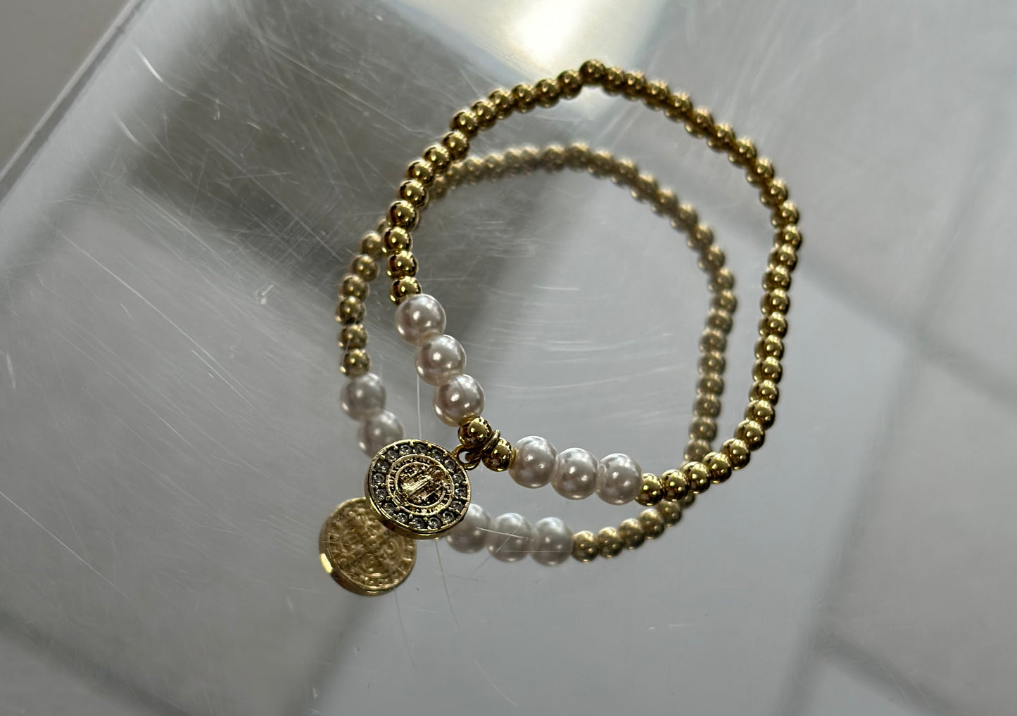 Pearl bracelet with laminated gold charm!